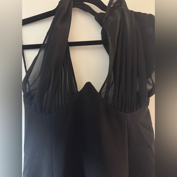 Luzina Midi Dress in Black
Camila Coelho - Picture 7 of 8